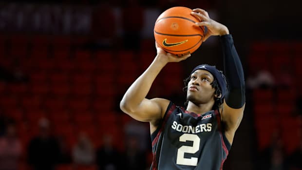Oklahoma Sooners guard Javian McCollum (2) makes a 3-pointer during a college basketball game between the University of Oklahoma Sooners (OU) and the West Virginia Mountaineers at Lloyd Noble Center in Norman, Okla., Okla., Wednesday, Jan. 17, 2024.